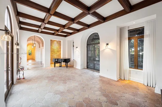 a view of an empty room with a fireplace