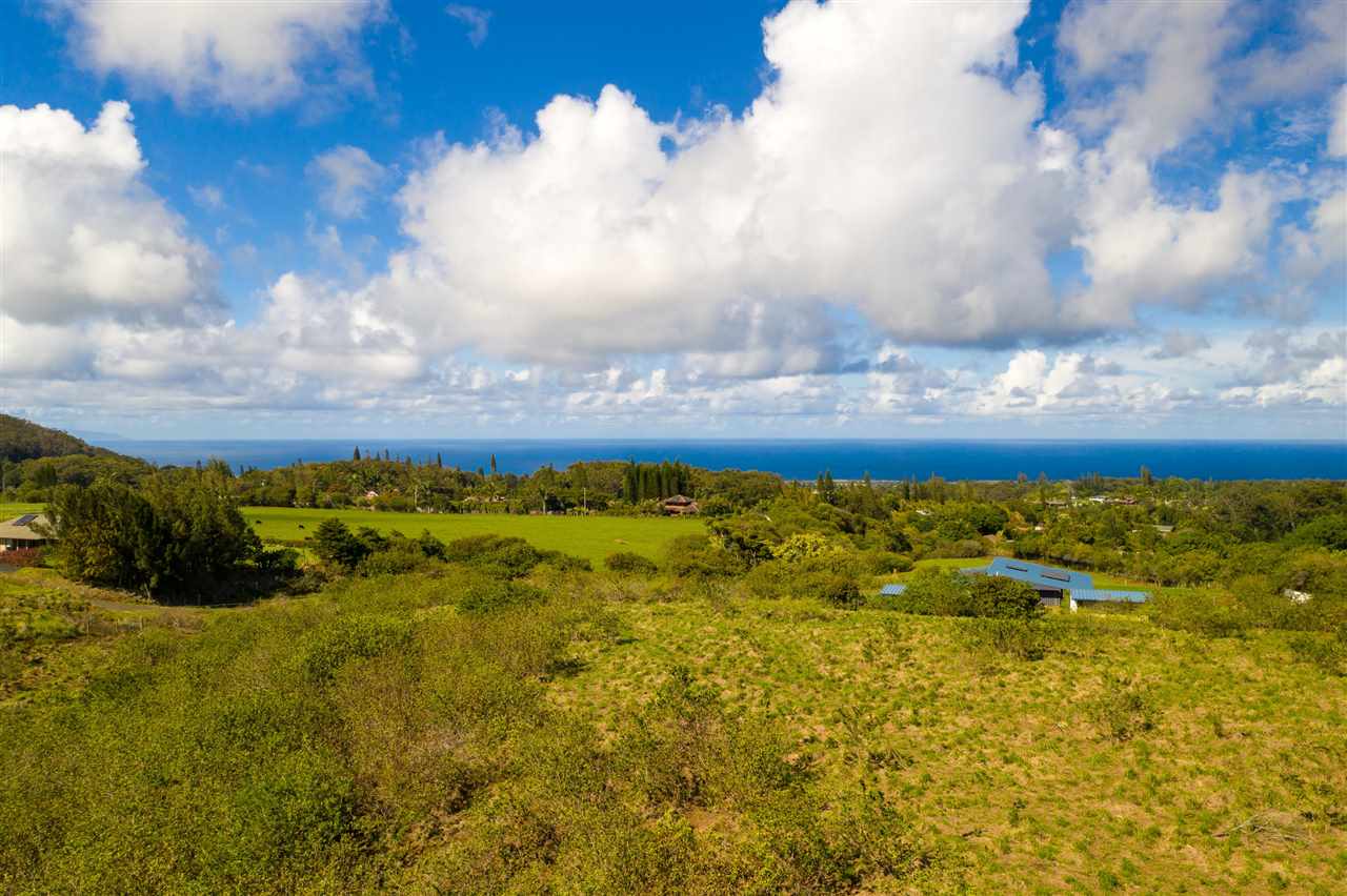 1891 Kauhikoa Road, Unit A Haiku, HI 96708 - Photo 1 of 12 a view of lake with mountain