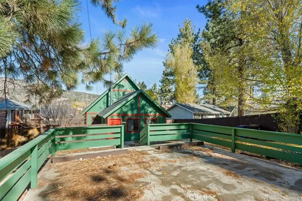 a view of backyard with green space