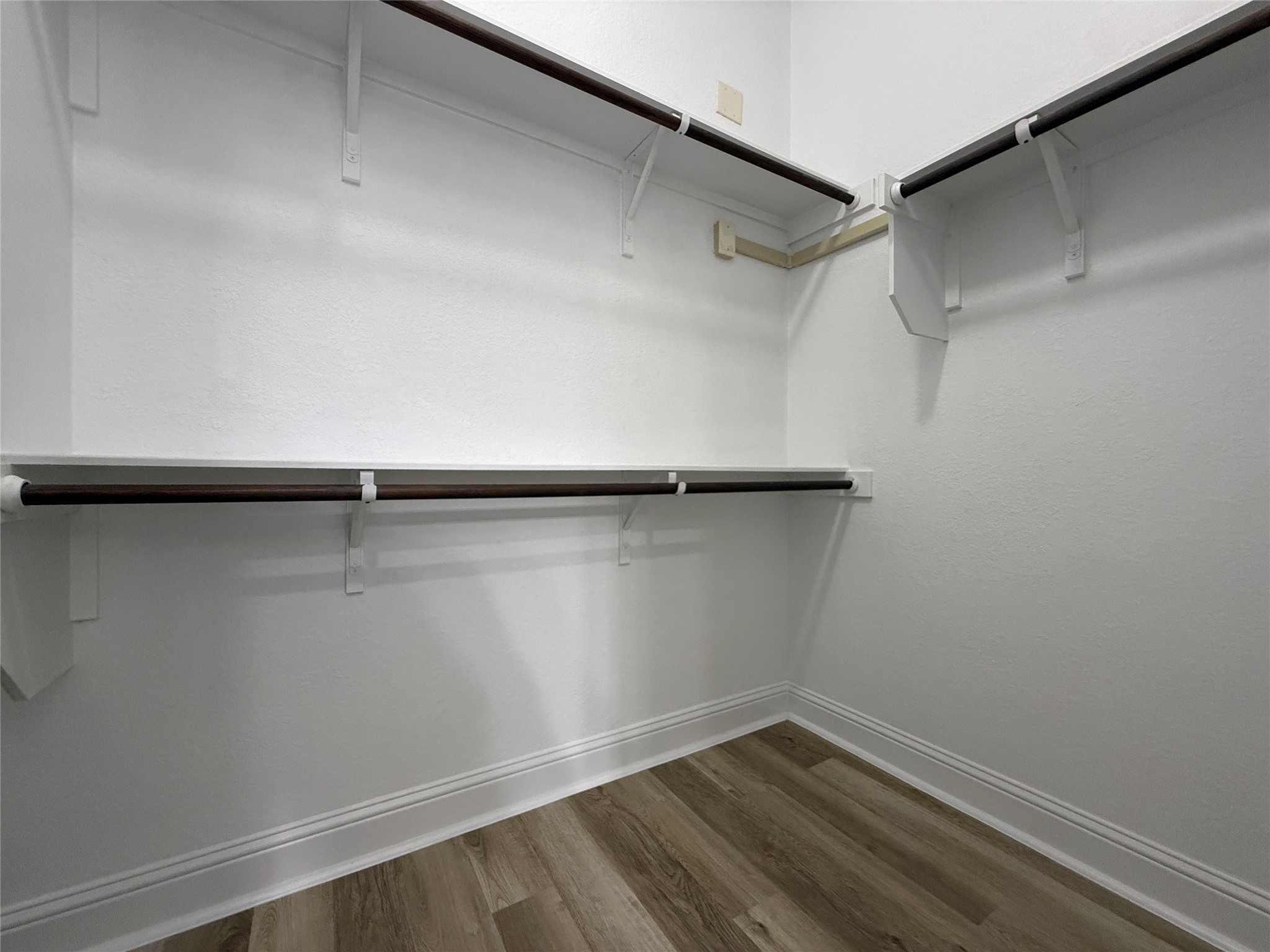 1512 Long Shadow Lane Georgetown, TX 78628 - Photo 13 of 19 a view of a room with shelf on the wall