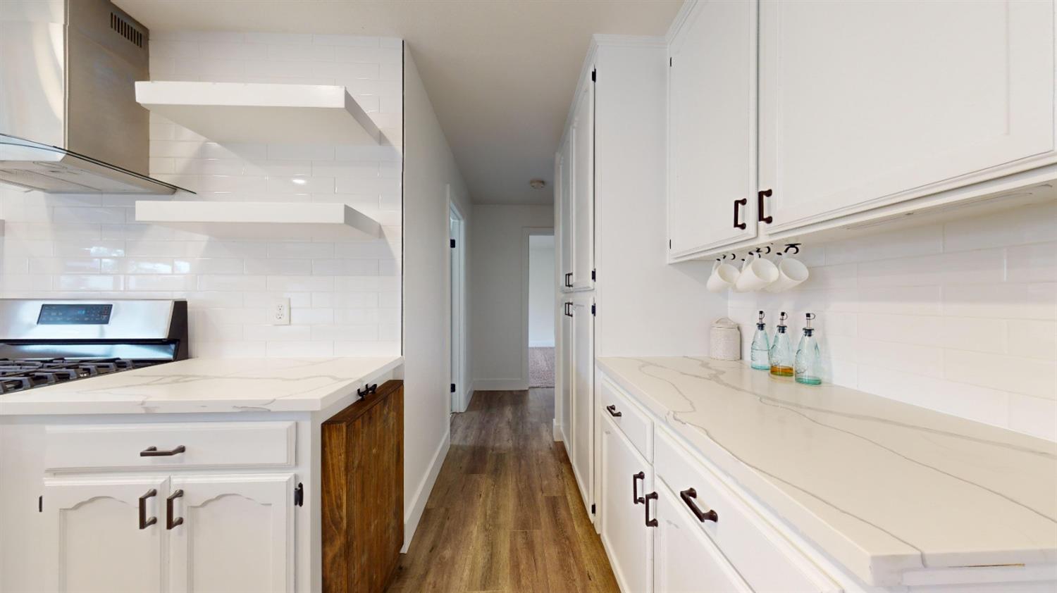 3053 Fowler Avenue Clovis, CA 93611 - Photo 16 of 48 HALLWAY VIEW FROM KITCHEN