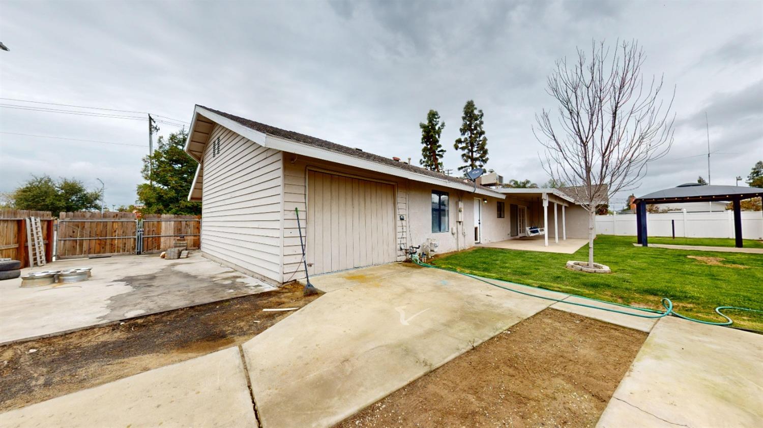 3053 Fowler Avenue Clovis, CA 93611 - Photo 44 of 48 SIDE YARD WITH 2 RV PARKING SPACES