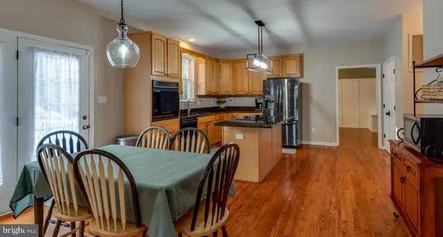 a bathroom with a toilet a sink and a shower