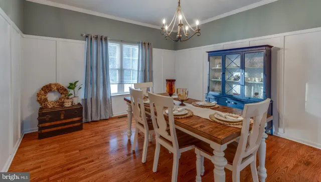 a bathroom with a sink a vanity and a mirror