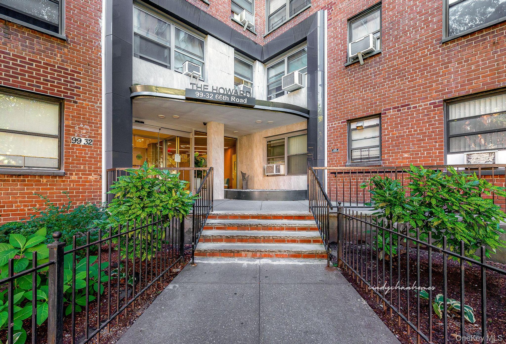 99-32 66th Road, Unit 5B Queens, NY 11374 - Photo 1 of 27 View of exterior entry featuring brick siding