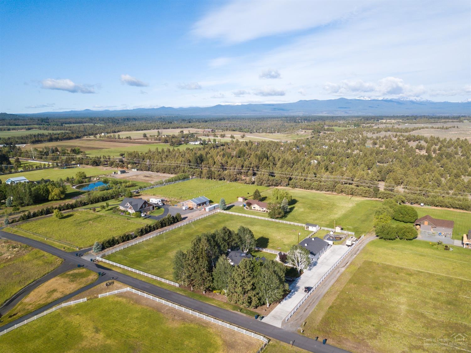64485 Research Road Bend, OR 97703 - Photo 14 of 18 a view of a swimming pool and an ocean view