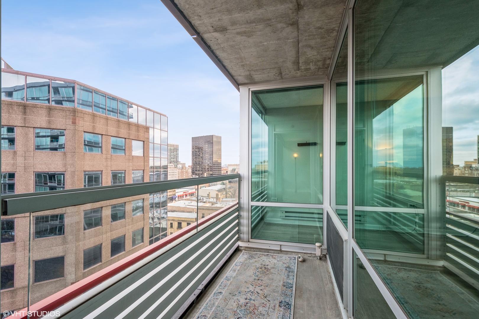 800 Elgin Road, Unit 1013 Evanston, IL 60201 - Photo 5 of 12 a view of a balcony with a large window