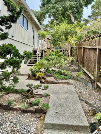 a backyard of a house with lots of green space
