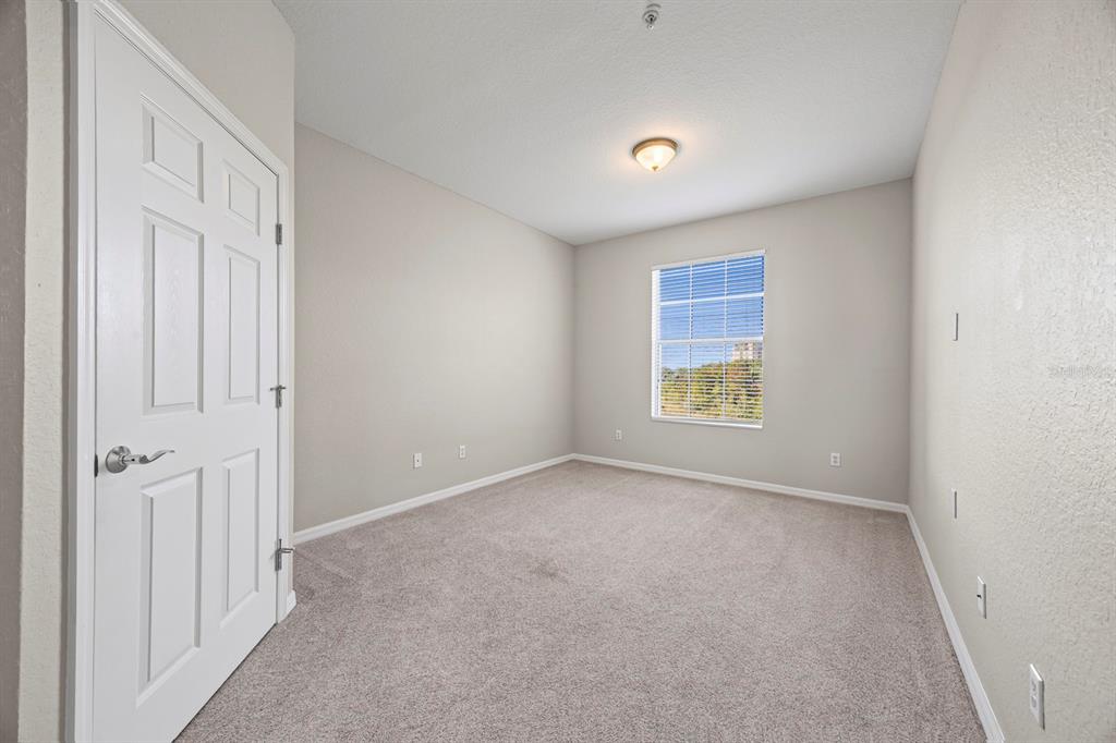 1355 Venezia Court, Unit 405 Davenport, FL 33896 - Photo 8 of 30 a view of an empty room