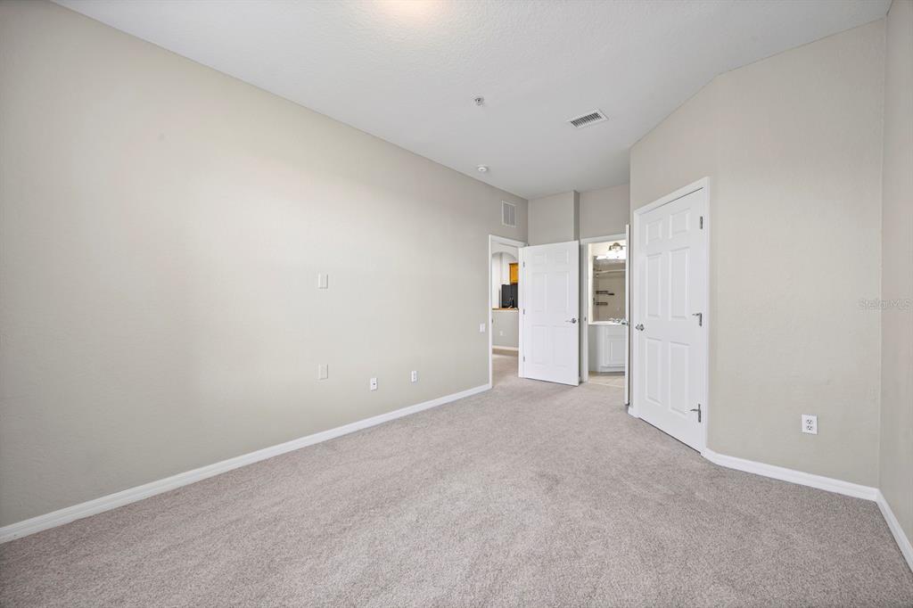 1355 Venezia Court, Unit 405 Davenport, FL 33896 - Photo 9 of 30 a view of empty room