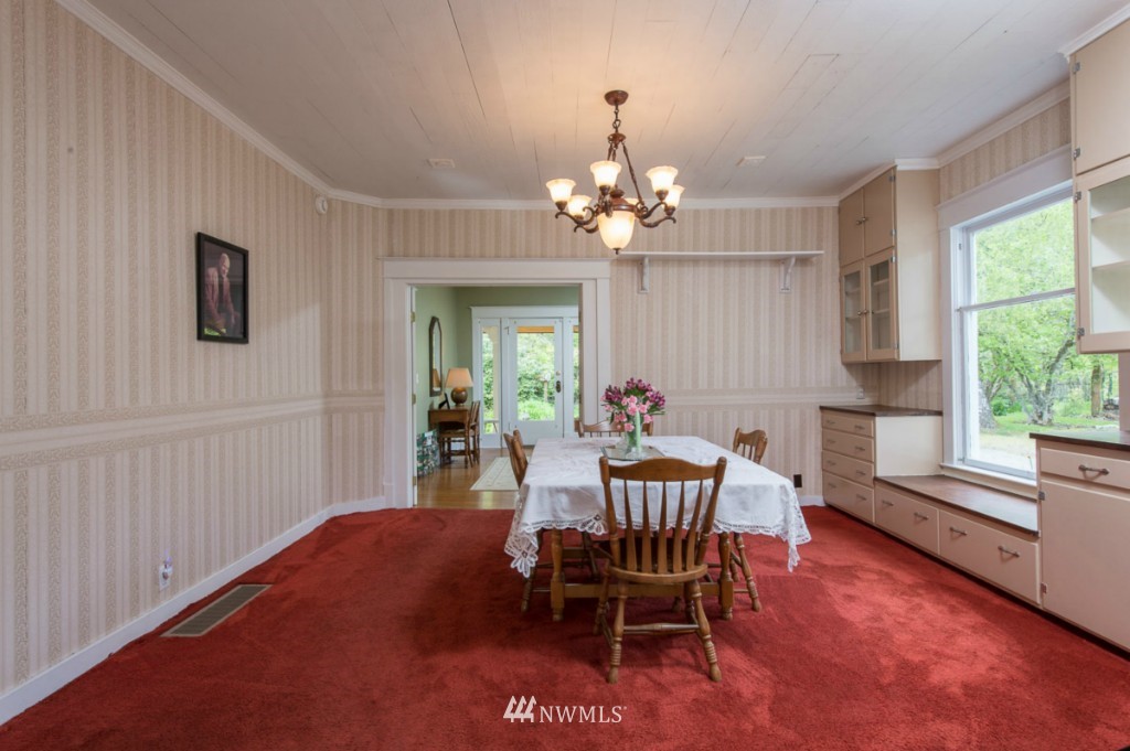 18624 Beall Road Southwest Vashon, WA 98070 - Photo 9 of 25 a view of a dining room with furniture window and outside view