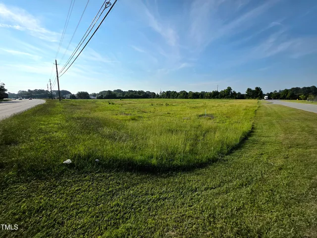 a view of a lake with a big yard