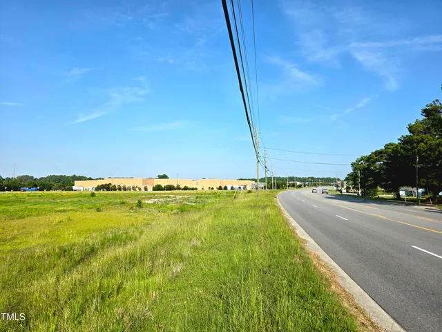 a view of a lake with a big yard