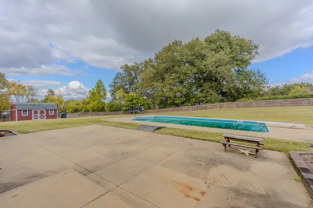 a view of an outdoor space and tennis court