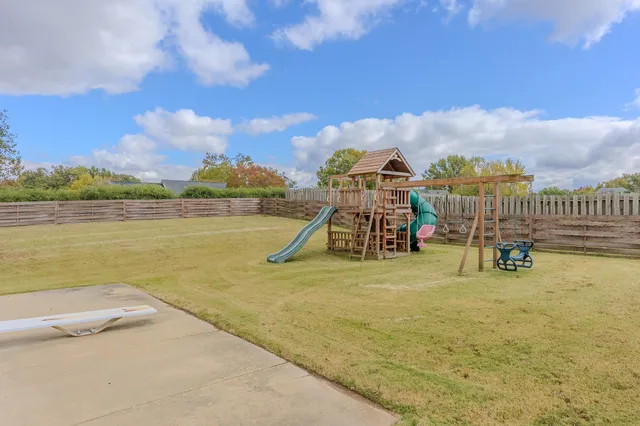 a view of a lake with a slide