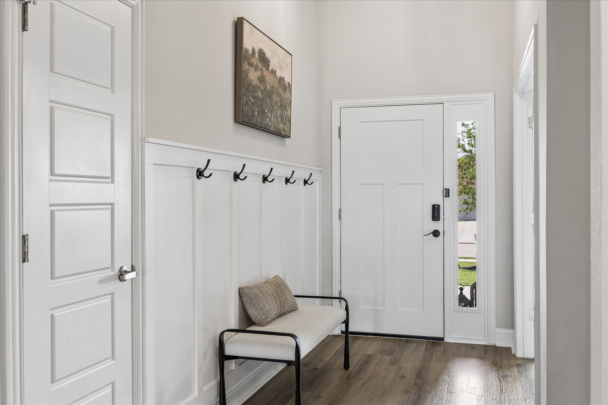 10227 Whitney Reach Drive Rosharon, TX 77583 - Photo 6 of 28 Entering from the covered porch is a nice entryway with room for your accessories. To the left of entry is a bedroom that is being used as a study.