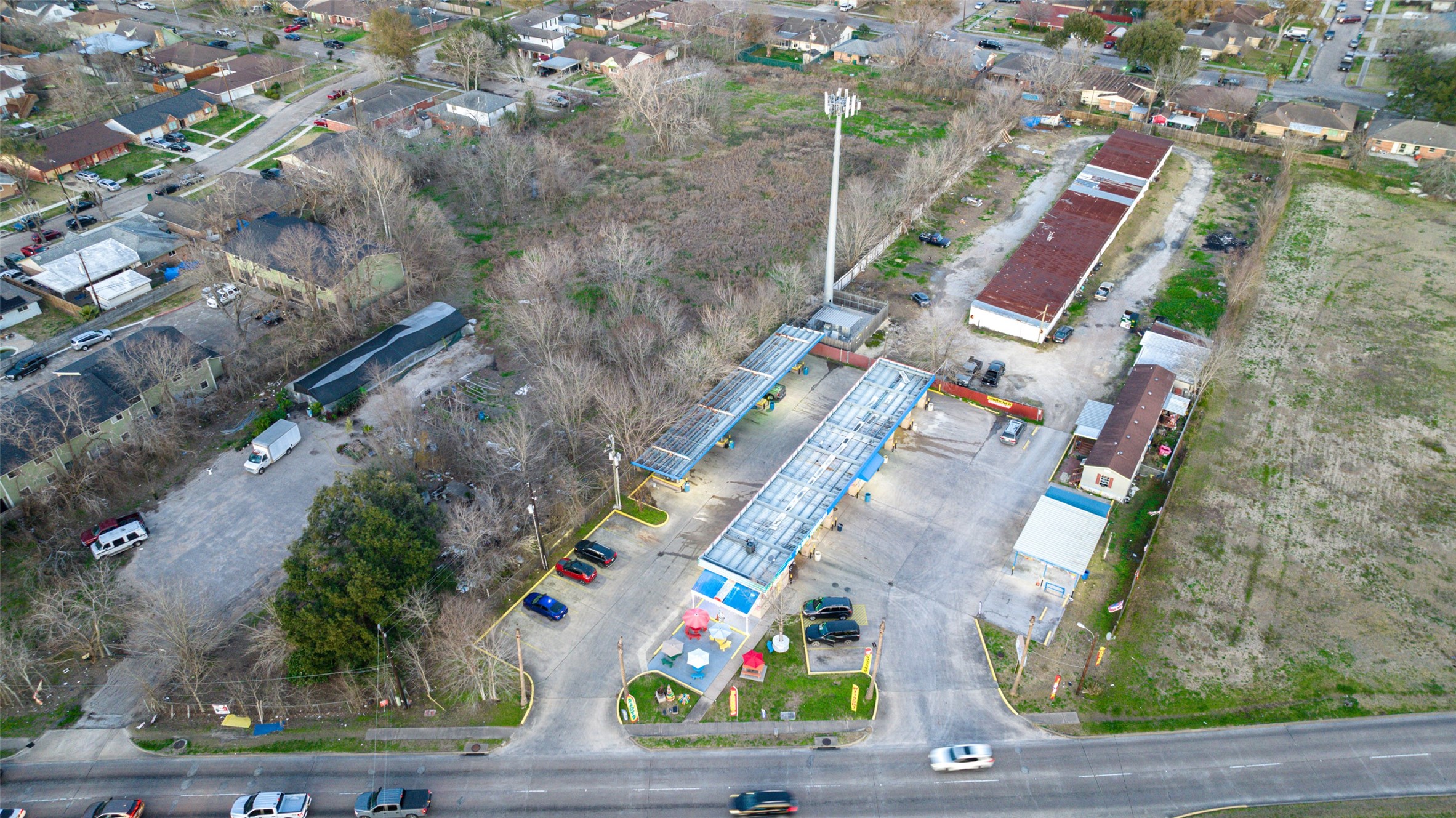 2627 Allen Genoa Road Pasadena, TX 77502 - Photo 12 of 37 an aerial view of residential houses with outdoor space