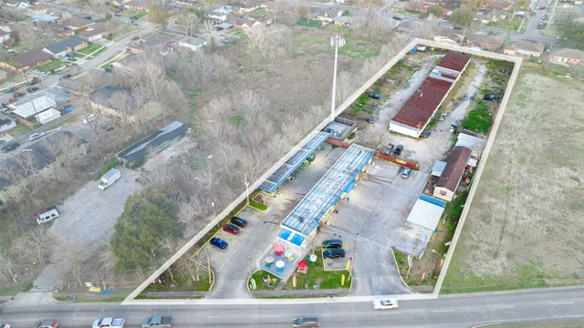 a view of a yard with an umbrella