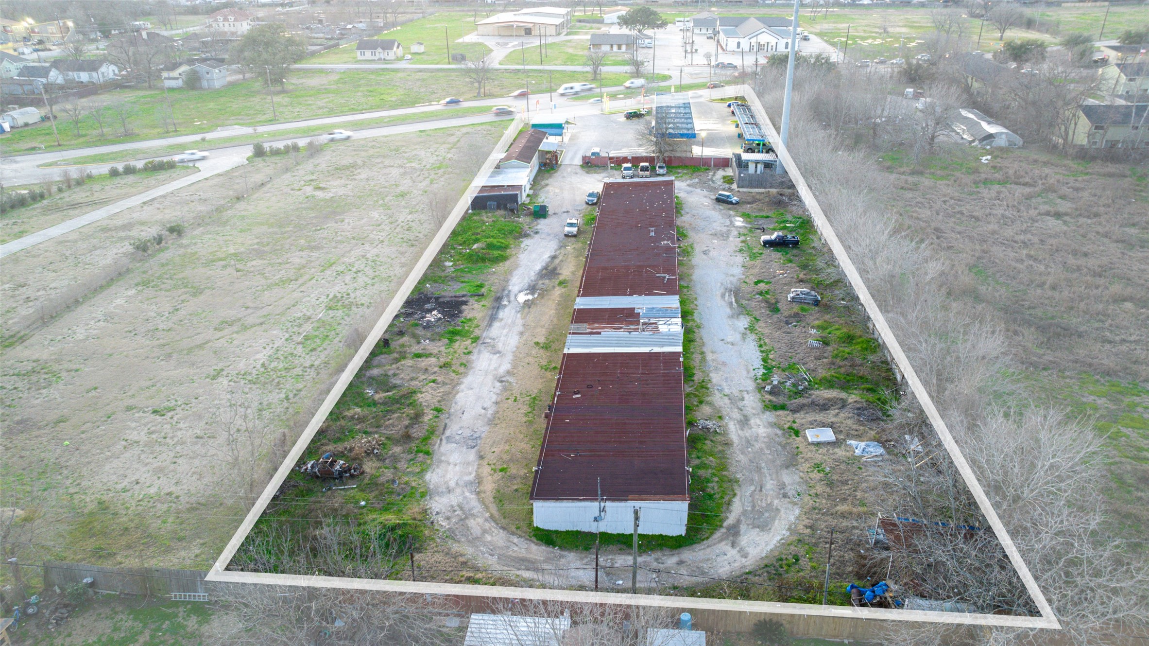 2627 Allen Genoa Road Pasadena, TX 77502 - Photo 16 of 37 a view of a yard with an umbrella
