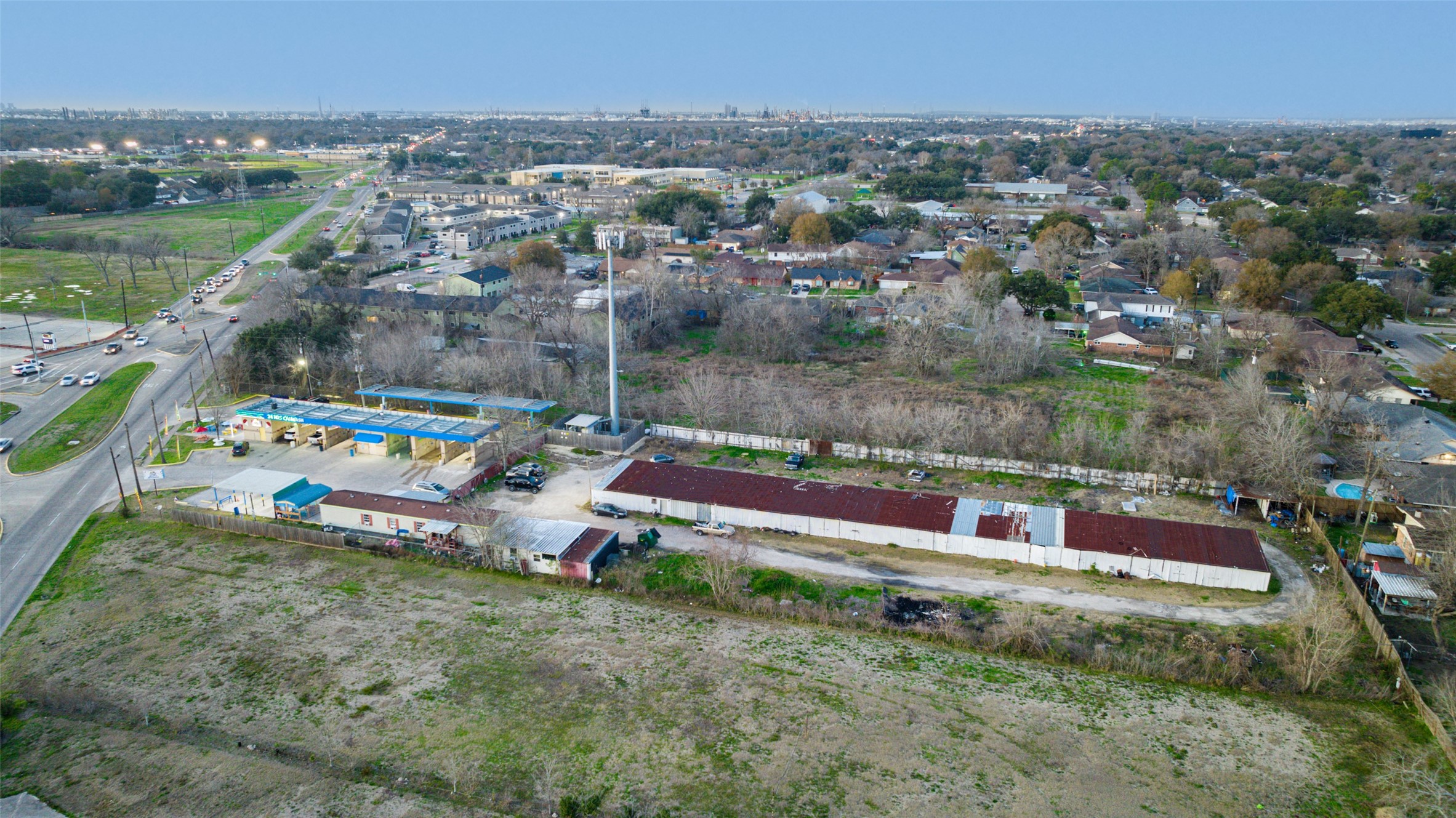 2627 Allen Genoa Road Pasadena, TX 77502 - Photo 20 of 37 an aerial view of multiple house with a yard