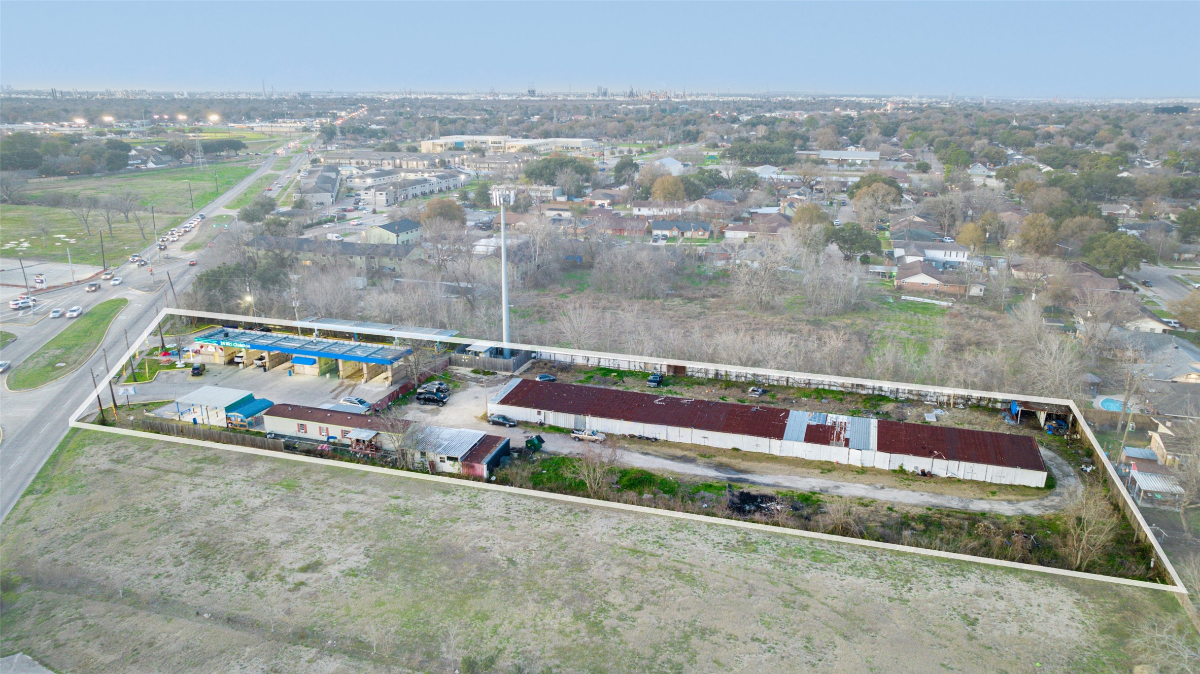 2627 Allen Genoa Road Pasadena, TX 77502 - Photo 21 of 37 an aerial view of residential houses with outdoor space and lakeside