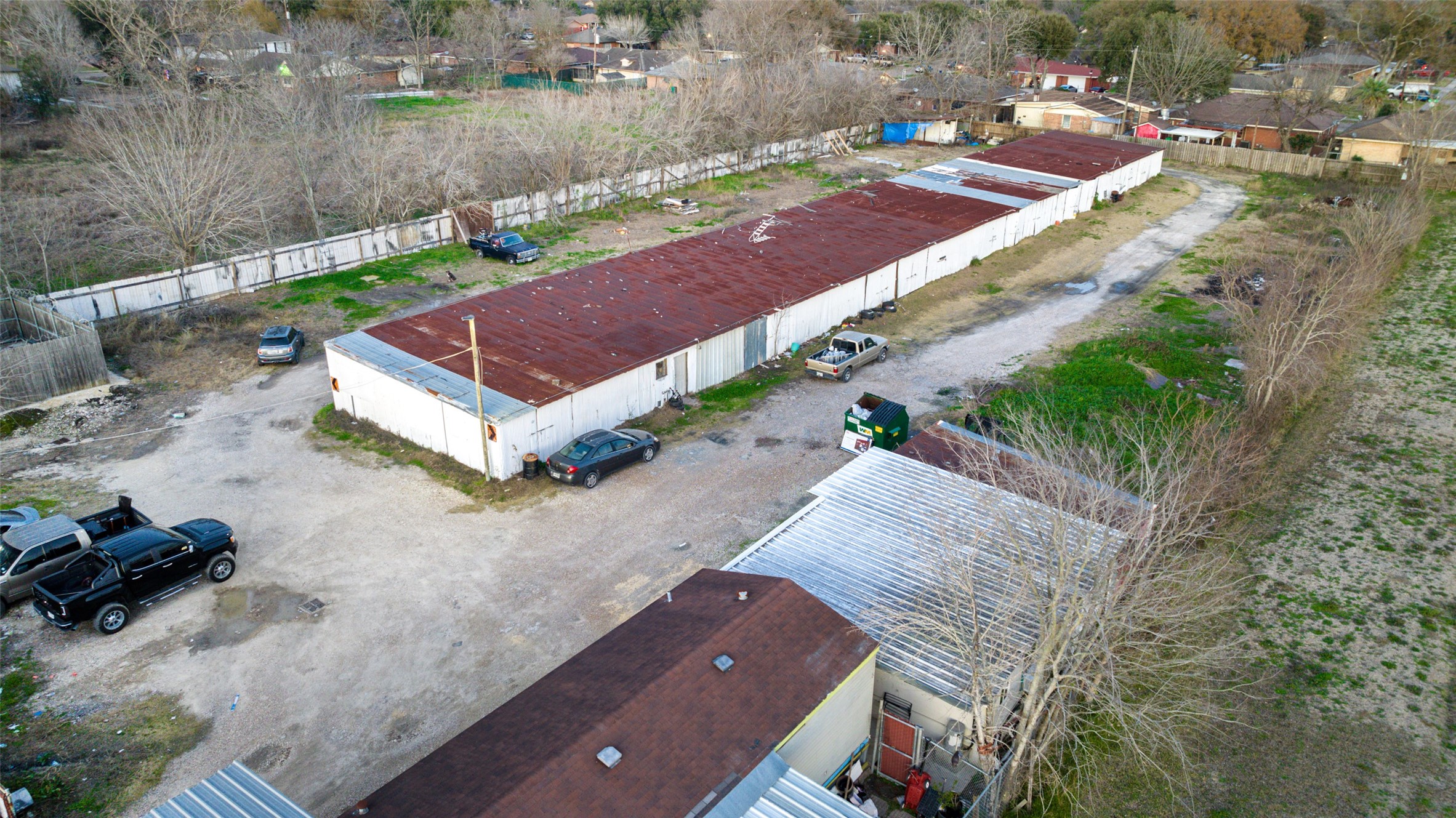 2627 Allen Genoa Road Pasadena, TX 77502 - Photo 23 of 37 an aerial view of a house with a yard