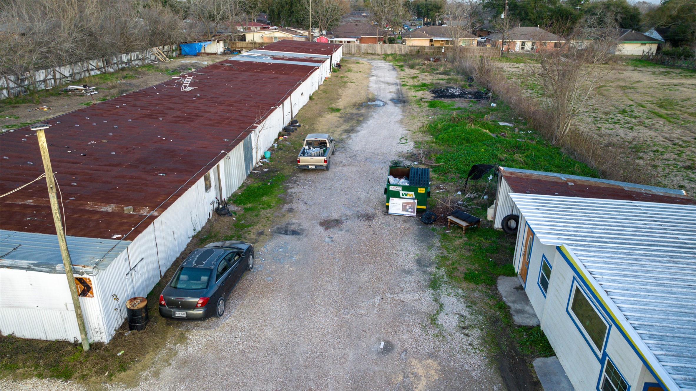 2627 Allen Genoa Road Pasadena, TX 77502 - Photo 24 of 37 a view of a backyard with sitting area