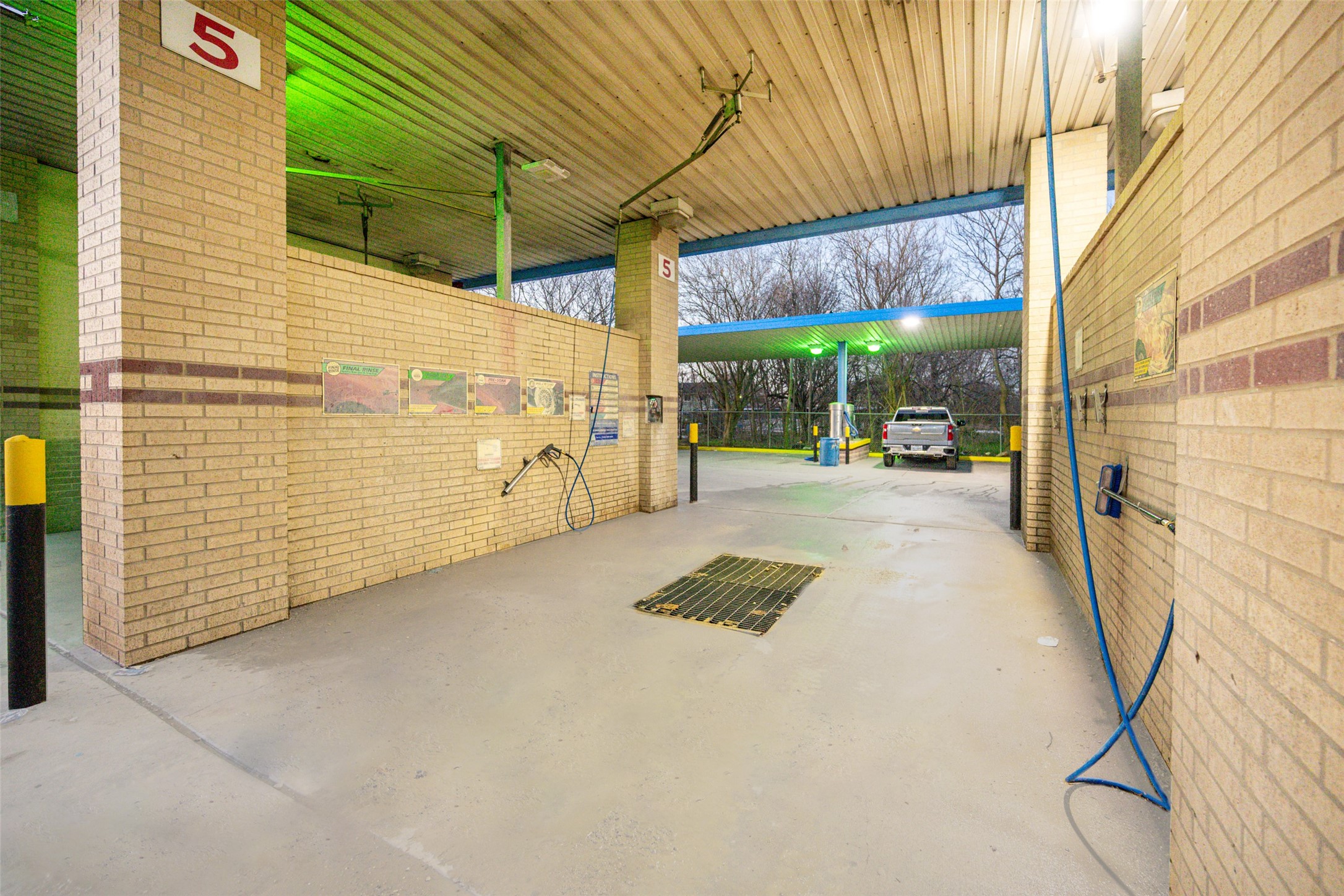 2627 Allen Genoa Road Pasadena, TX 77502 - Photo 32 of 37 a view of a patio with table and chairs and potted plants
