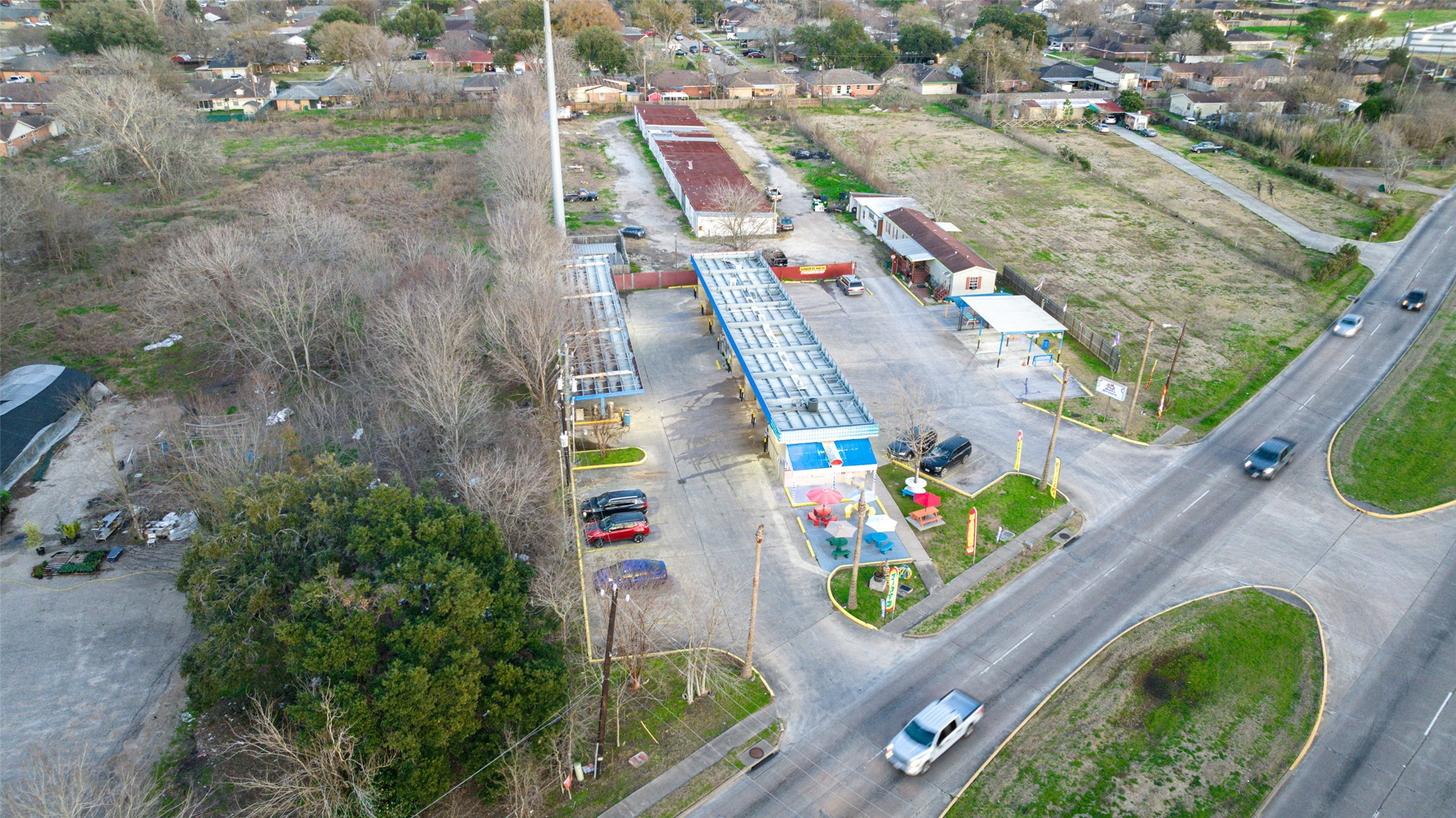 2627 Allen Genoa Road Pasadena, TX 77502 - Photo 10 of 37 an aerial view of residential houses with outdoor space