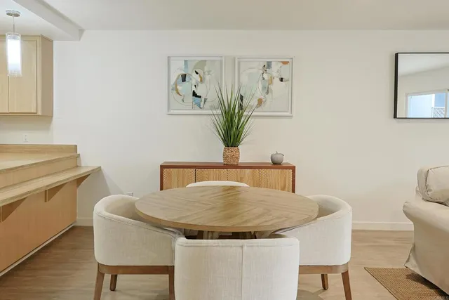 a dining room with table and chair