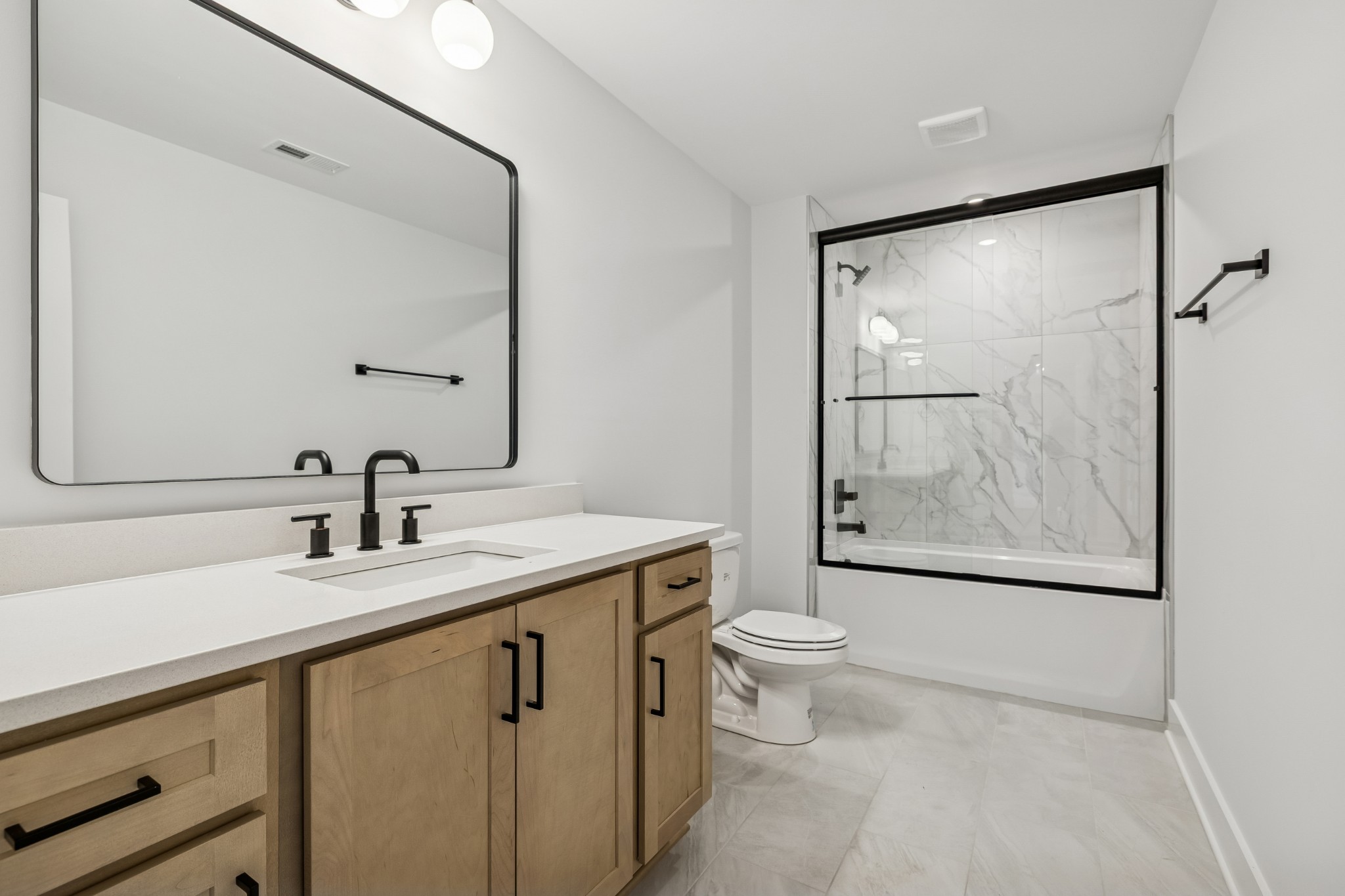 9665 McKee Road Lascassas, TN 37085 - Photo 51 of 73 a bathroom with a granite countertop sink toilet and shower