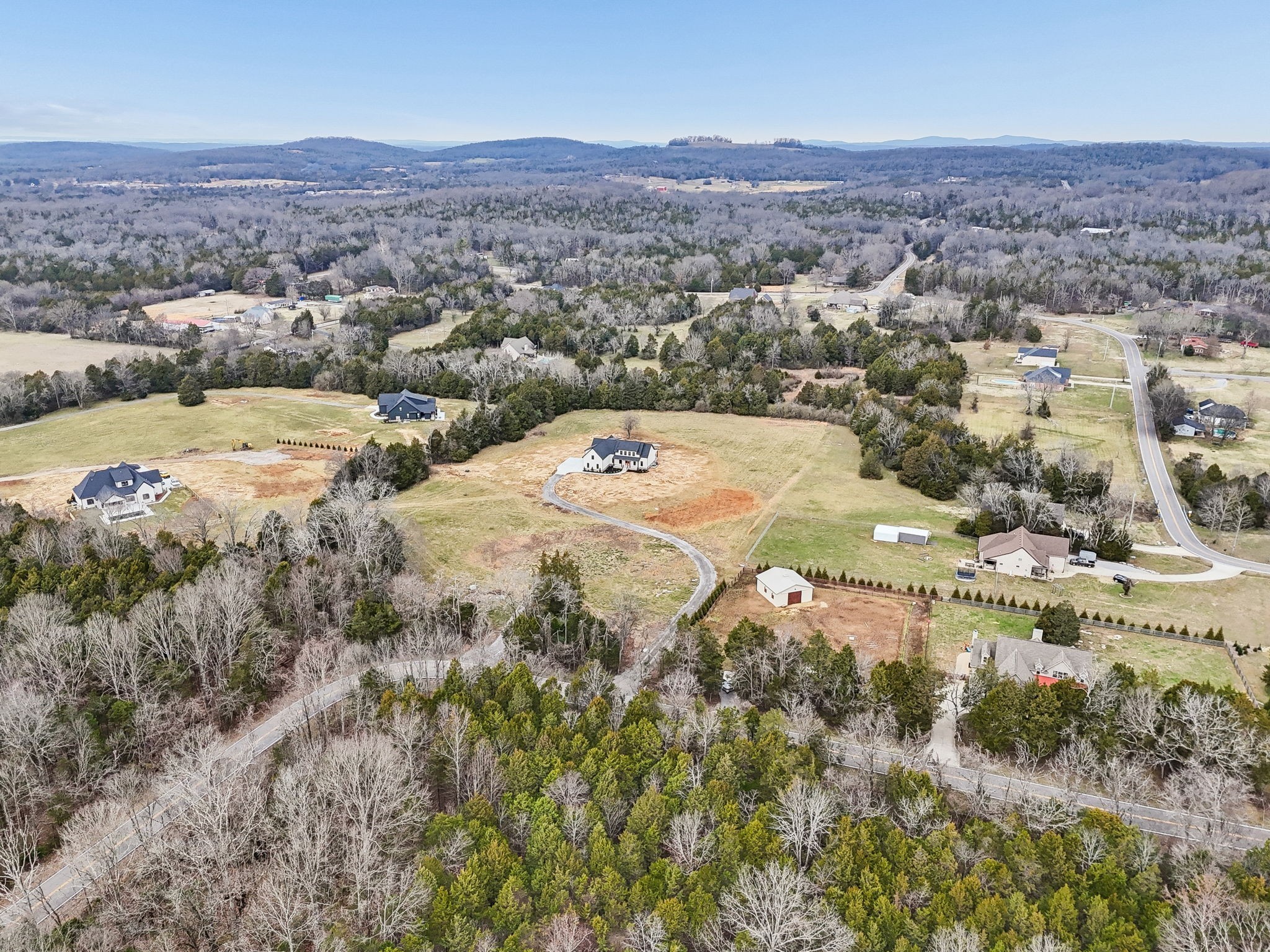 9665 McKee Road Lascassas, TN 37085 - Photo 69 of 73 an aerial view of residential houses with outdoor space and trees