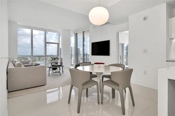 a view of a dining room with furniture