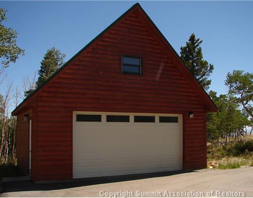 317 Sheep Ridge Road Fairplay, CO 80440 - Photo 11 of 12 a front view of a house with a garage