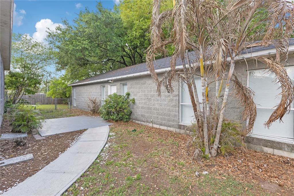 704 Grape Avenue St. Cloud, FL 34769 - Photo 14 of 30 a view of a house with a yard