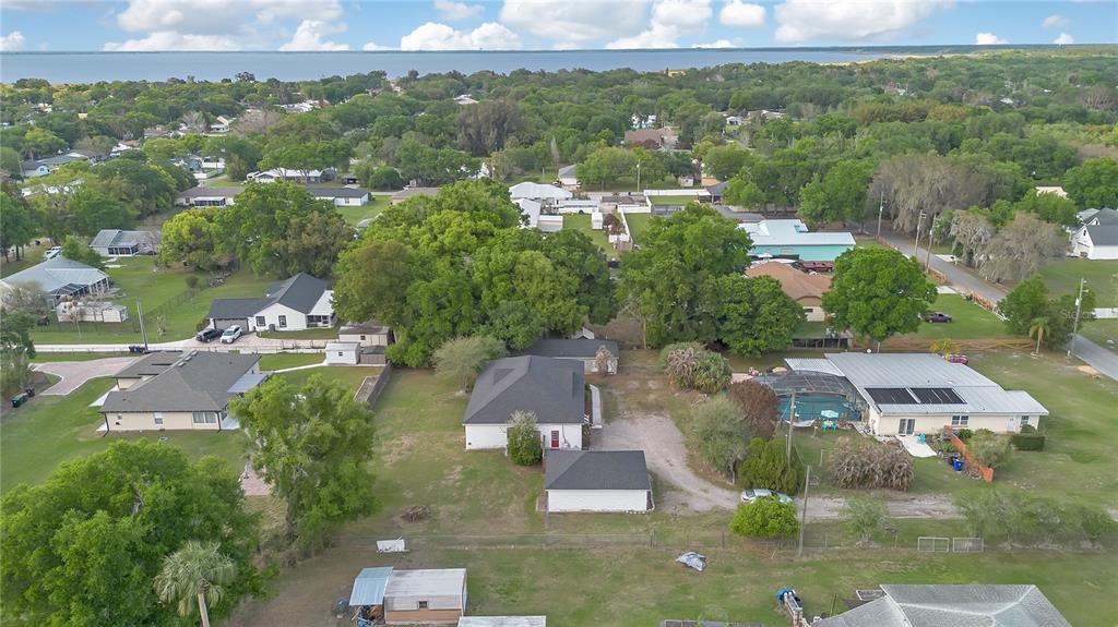 704 Grape Avenue St. Cloud, FL 34769 - Photo 28 of 30 an aerial view of multiple houses with yard
