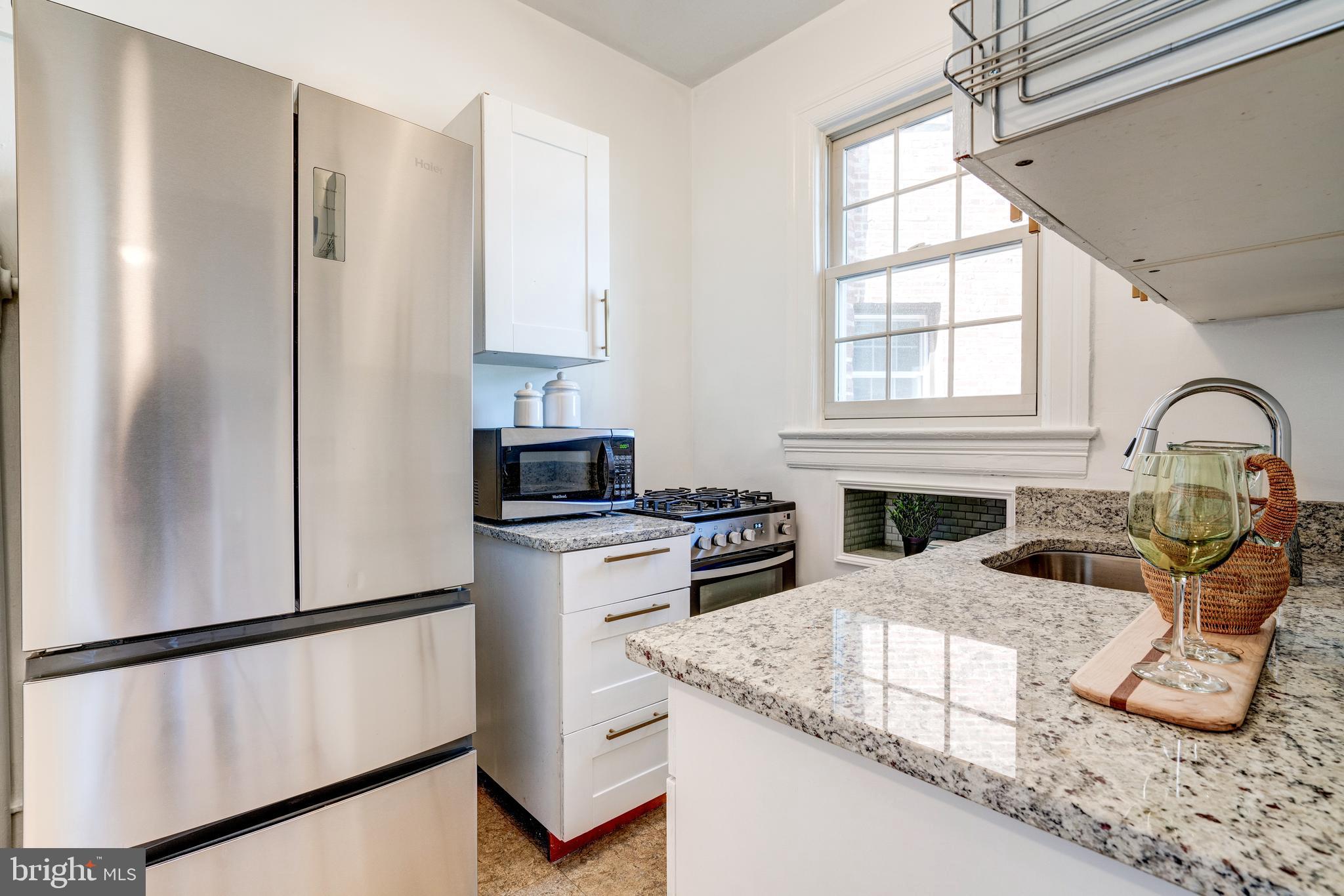 2707 Adams Mill Road Northwest, Unit 408 Washington, DC 20009 - Photo 9 of 21 New oven and refrigerator