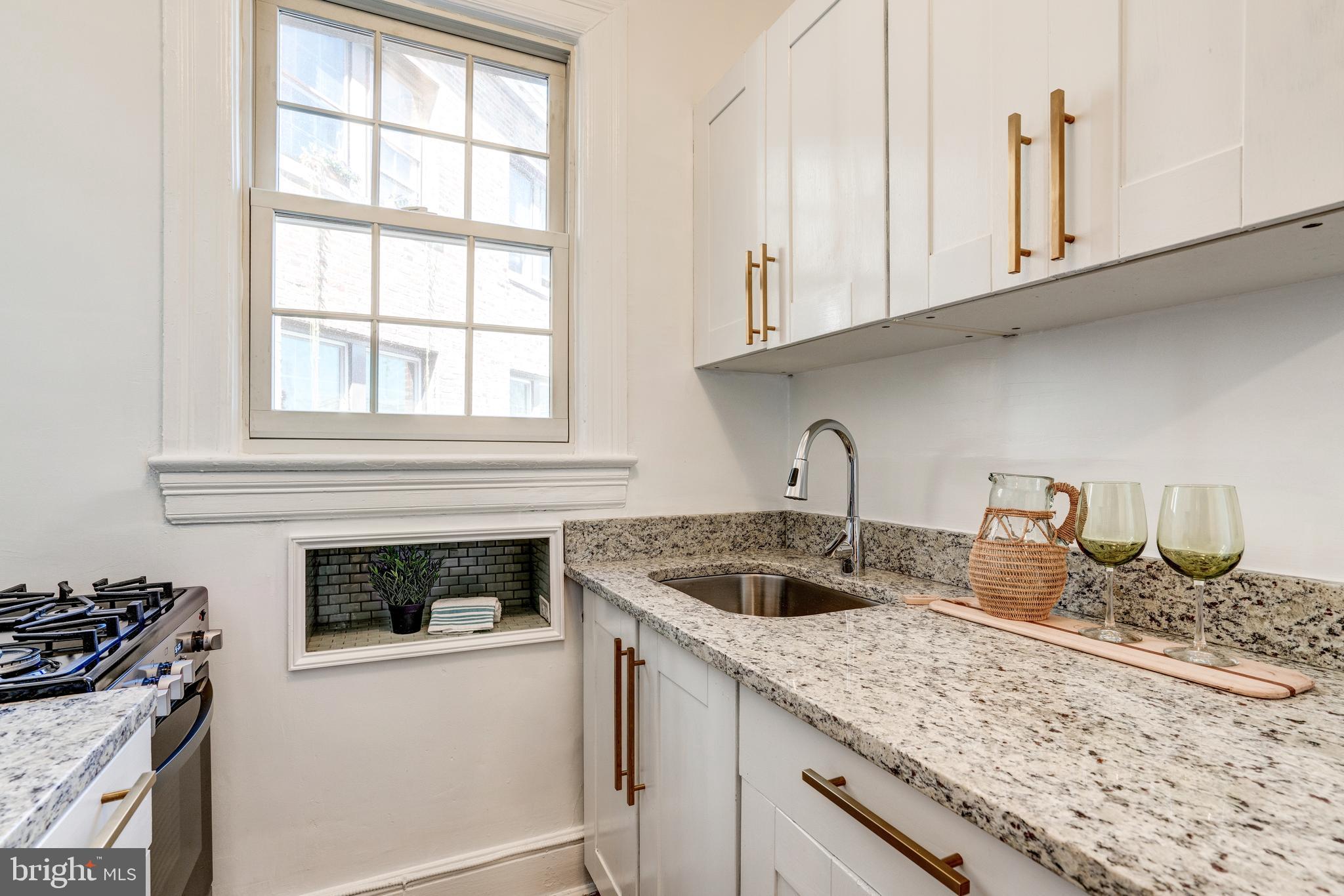 2707 Adams Mill Road Northwest, Unit 408 Washington, DC 20009 - Photo 10 of 21 Brand new modern countertops and finishes