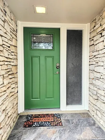 a view of a entryway door of the house
