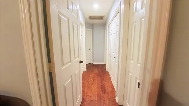 a view of a bathroom with a sink and a mirror