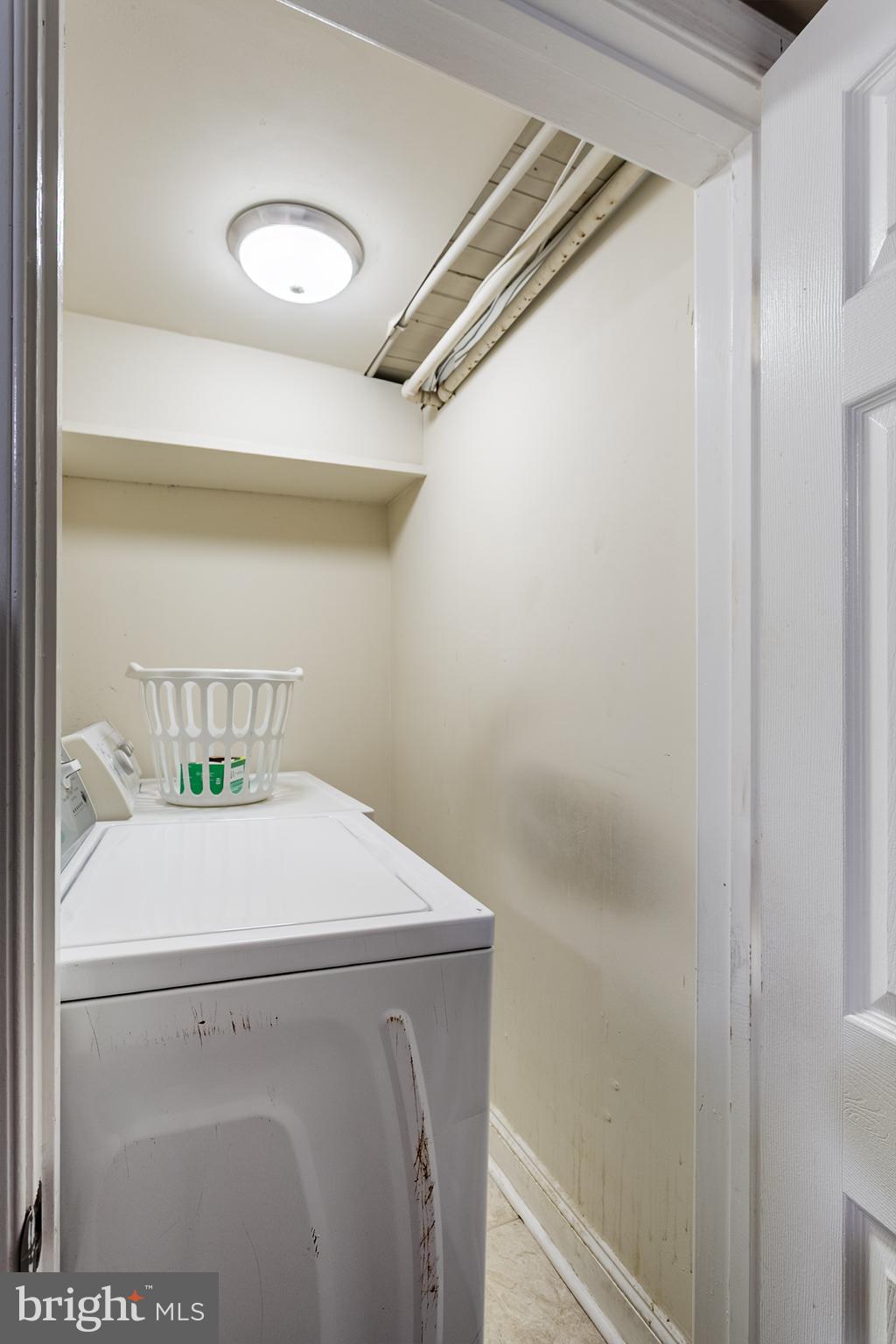 2736 East Preston Street Baltimore, MD 21213 - Photo 13 of 15 a utility room with dryer and washer