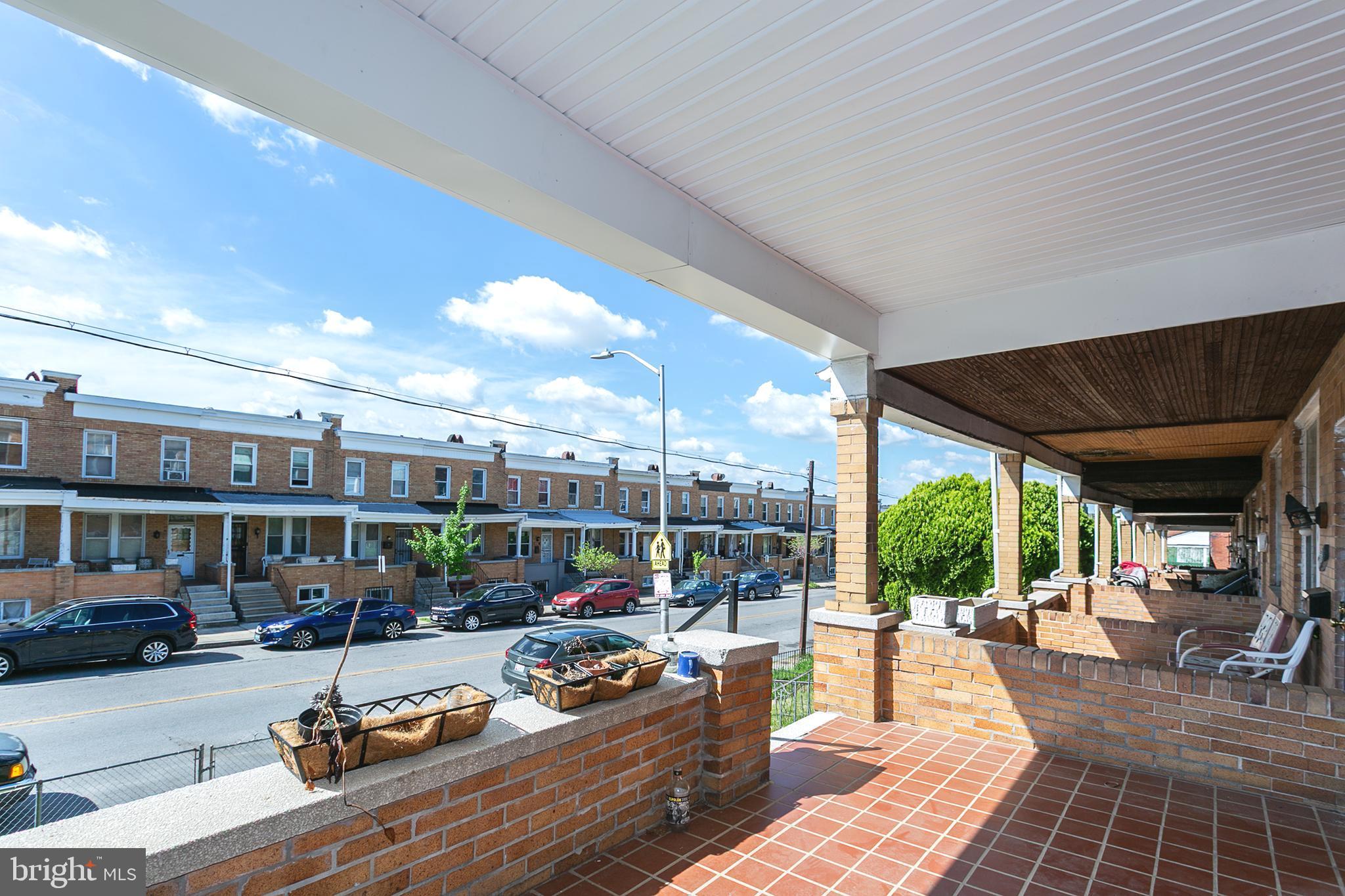2736 East Preston Street Baltimore, MD 21213 - Photo 2 of 15 a view of a patio with couches and chairs