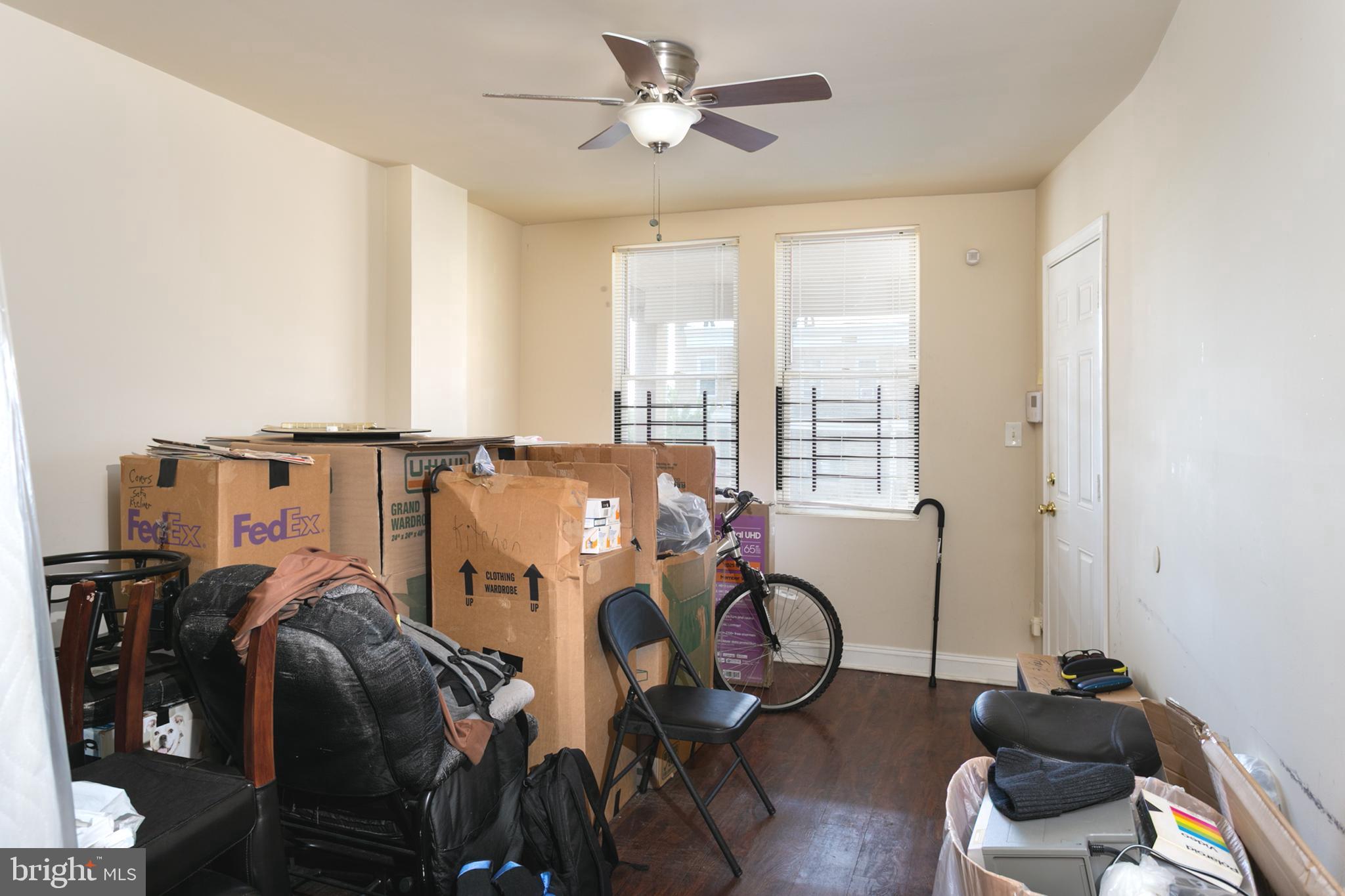 2736 East Preston Street Baltimore, MD 21213 - Photo 8 of 15 a view of a workspace with furniture and a window