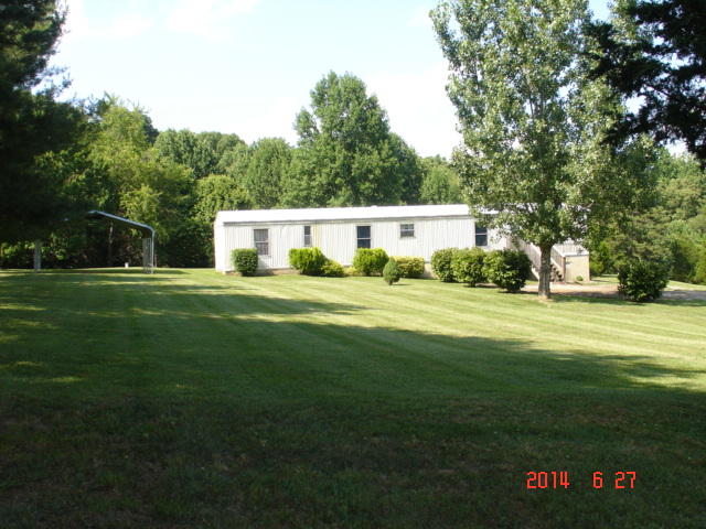 104 Ramblin Rose Road Vinton, VA 24179 - Photo 1 of 14 a house view with a garden space