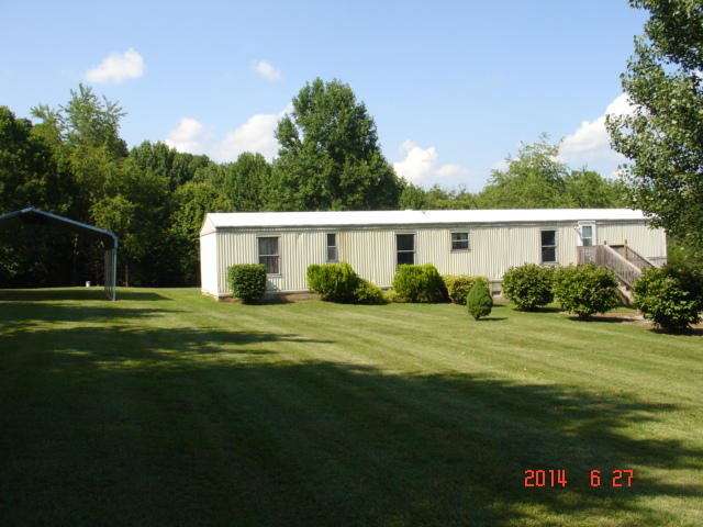 104 Ramblin Rose Road Vinton, VA 24179 - Photo 11 of 14 a front view of a house with a garden