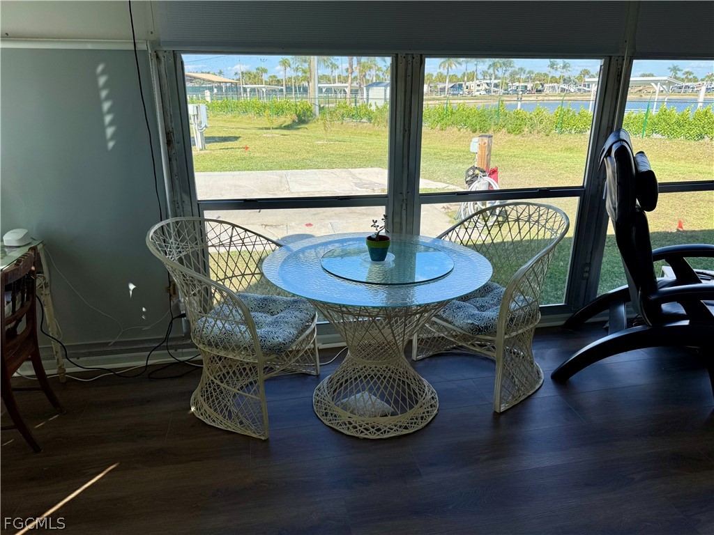 19681 Summerlin Road, Unit 482 Fort Myers, FL 33908 - Photo 16 of 35 a room with furniture and a large window