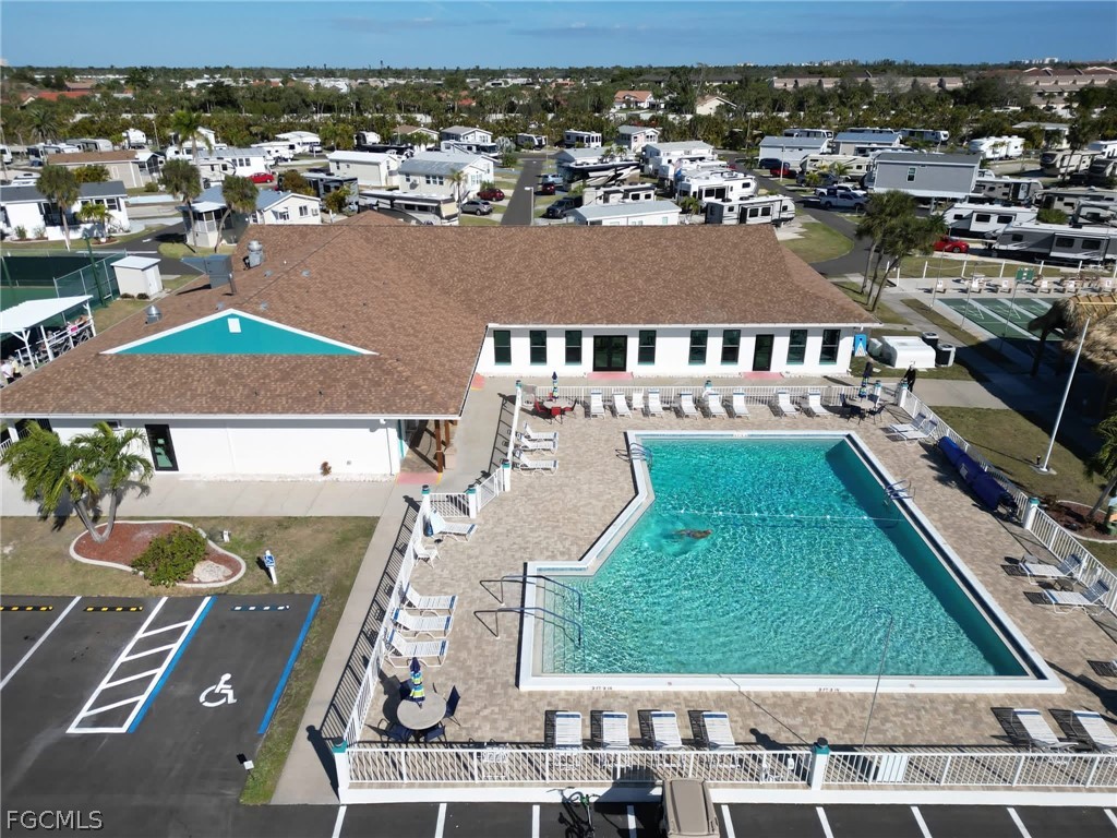 19681 Summerlin Road, Unit 482 Fort Myers, FL 33908 - Photo 34 of 35 an aerial view of residential houses with outdoor space