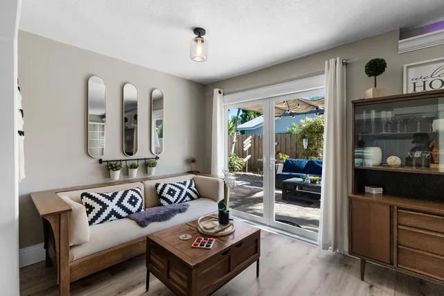 a bedroom with a bed and a table