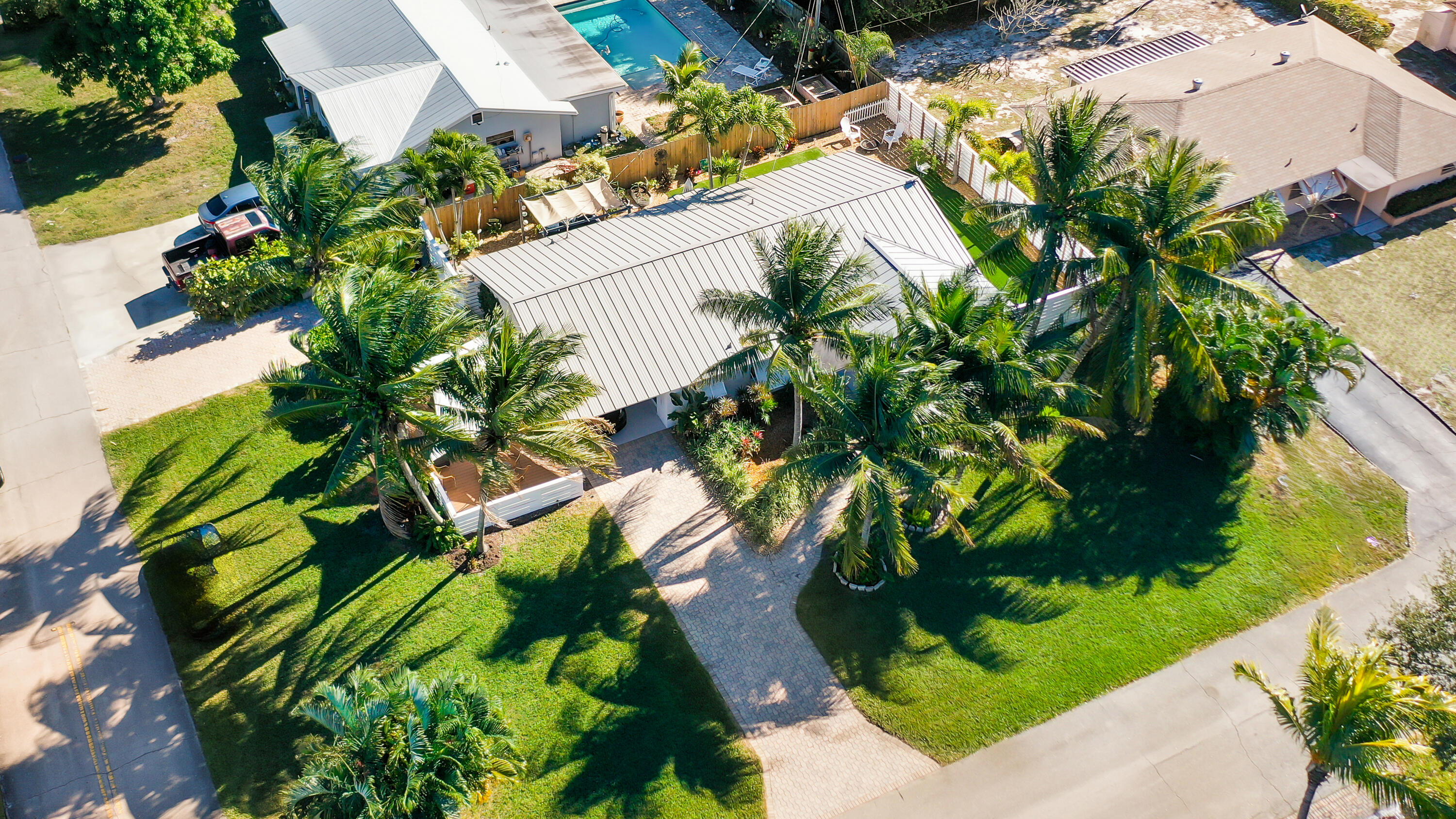 1605 Treemont Avenue Jupiter, FL 33469 - Photo 4 of 35 an aerial view of a yard