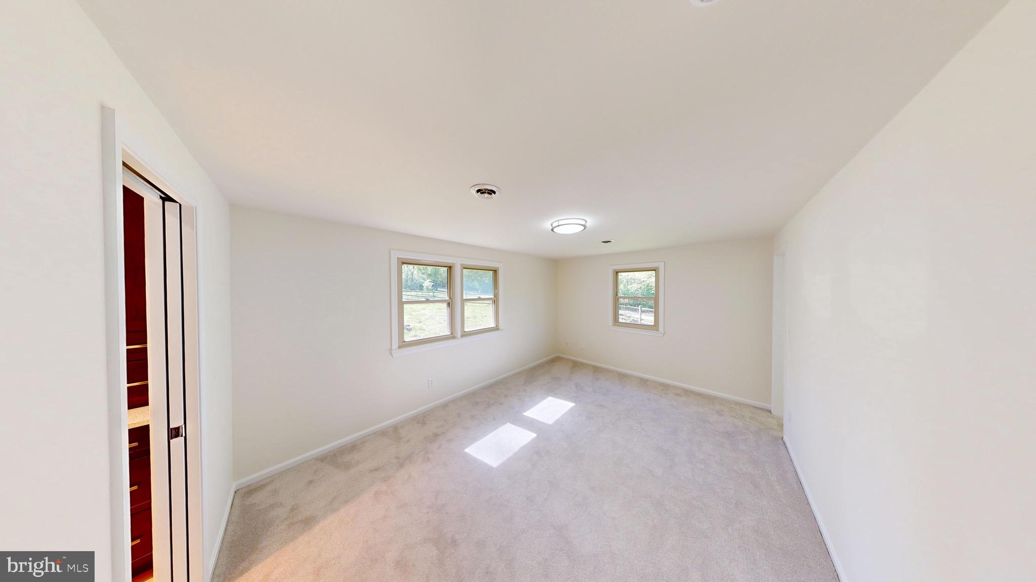 729 West Watersville Road Mount Airy, MD 21771 - Photo 15 of 42 an empty room with windows
